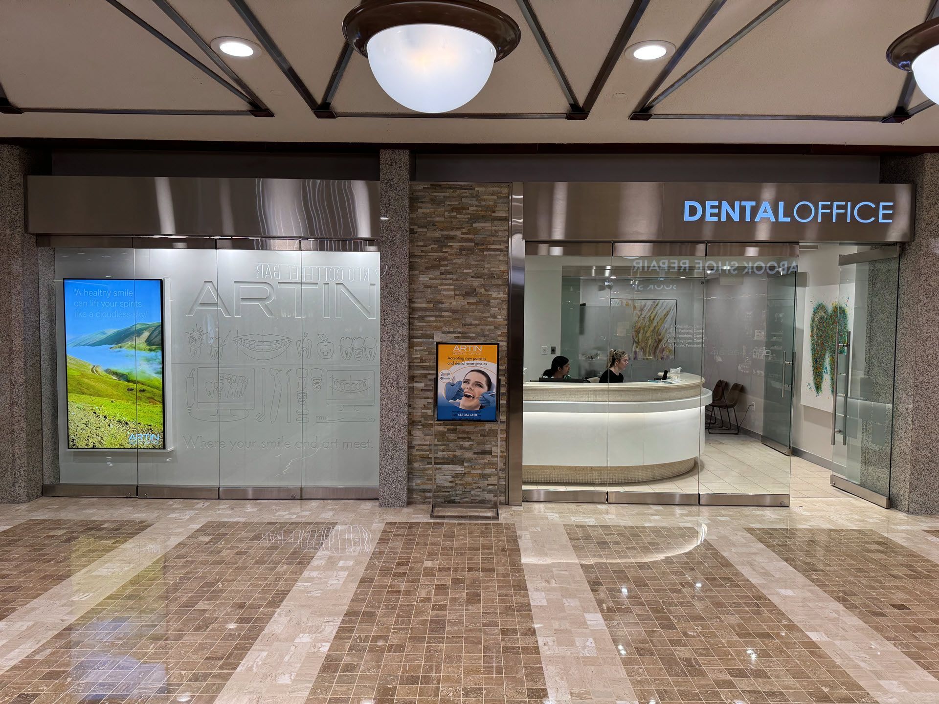 Artin Dental dental office in a mall with a marble floor.