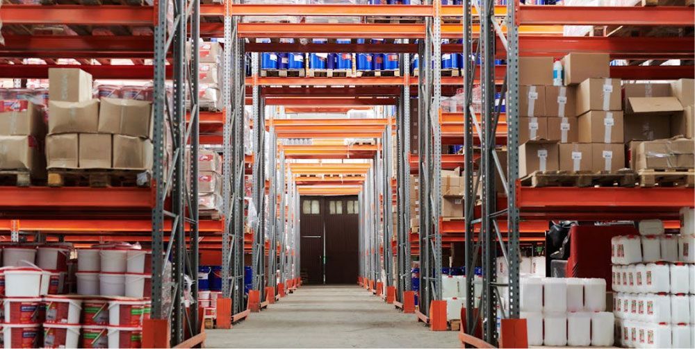 A warehouse filled with lots of boxes and containers.