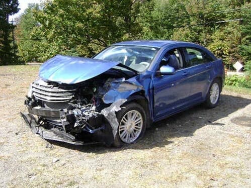 Damaged Blue Car — Gardiner, ME — Daniel's Auto Body