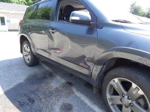 Dented Car Door — Gardiner, ME — Daniel's Auto Body