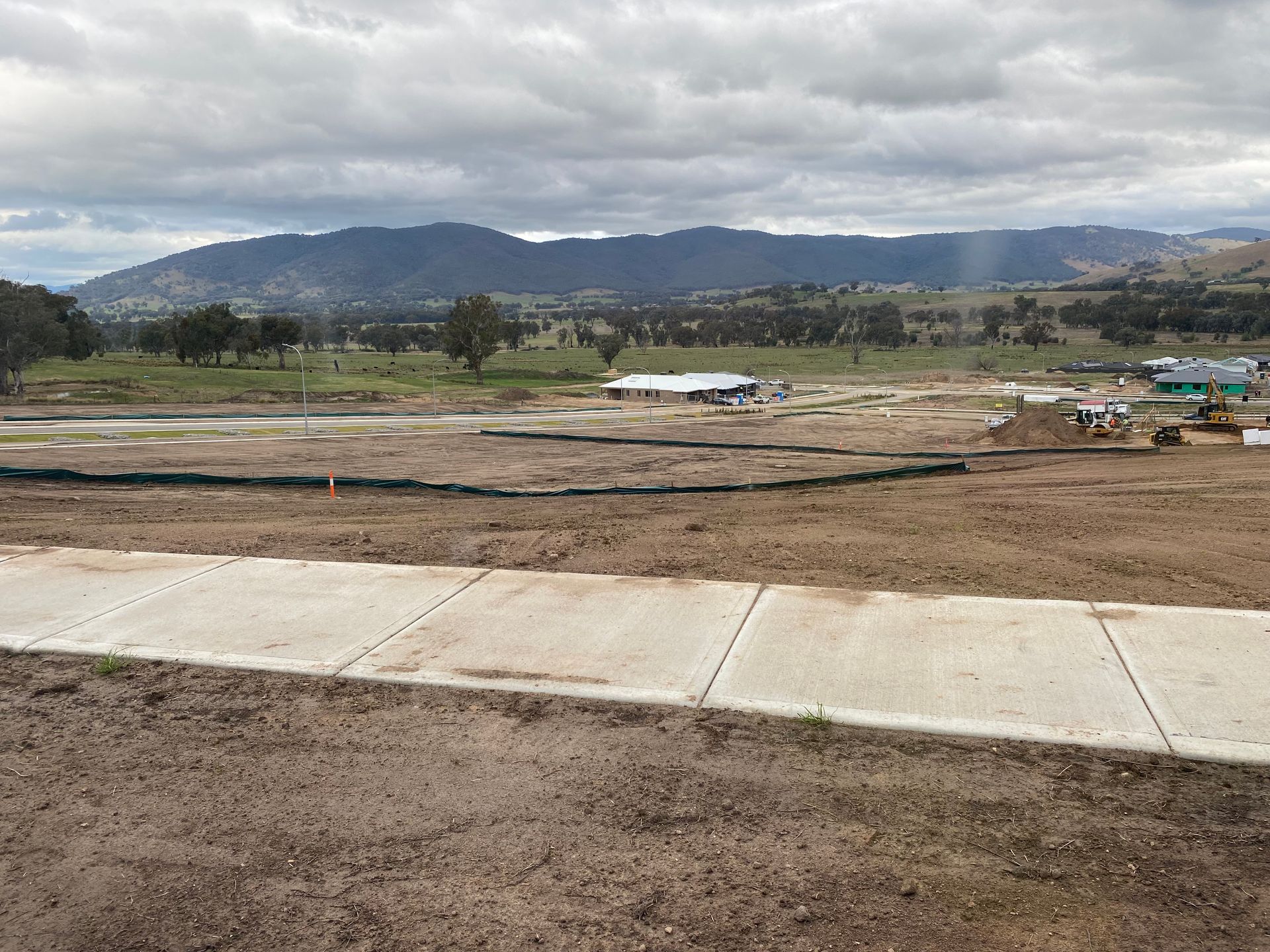A house is being built with a lot of wood and bricks.