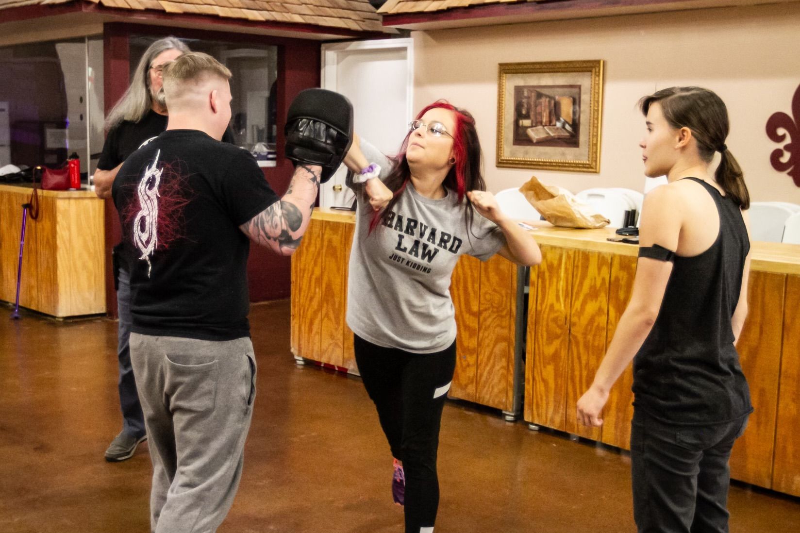 Beginners practice self-defense drills at Agoge Krav Maga in Lindale, TX, building confidence.