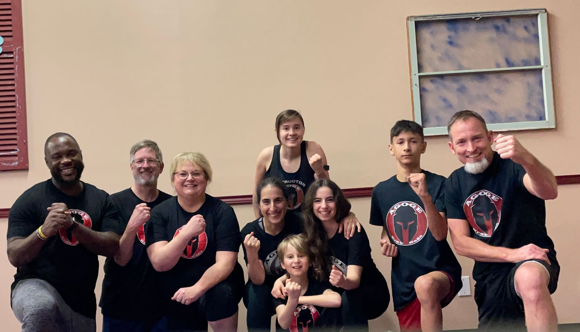 Students practice pad strikes at Agoge Krav Maga in Lindale, TX, building practical self-defense.