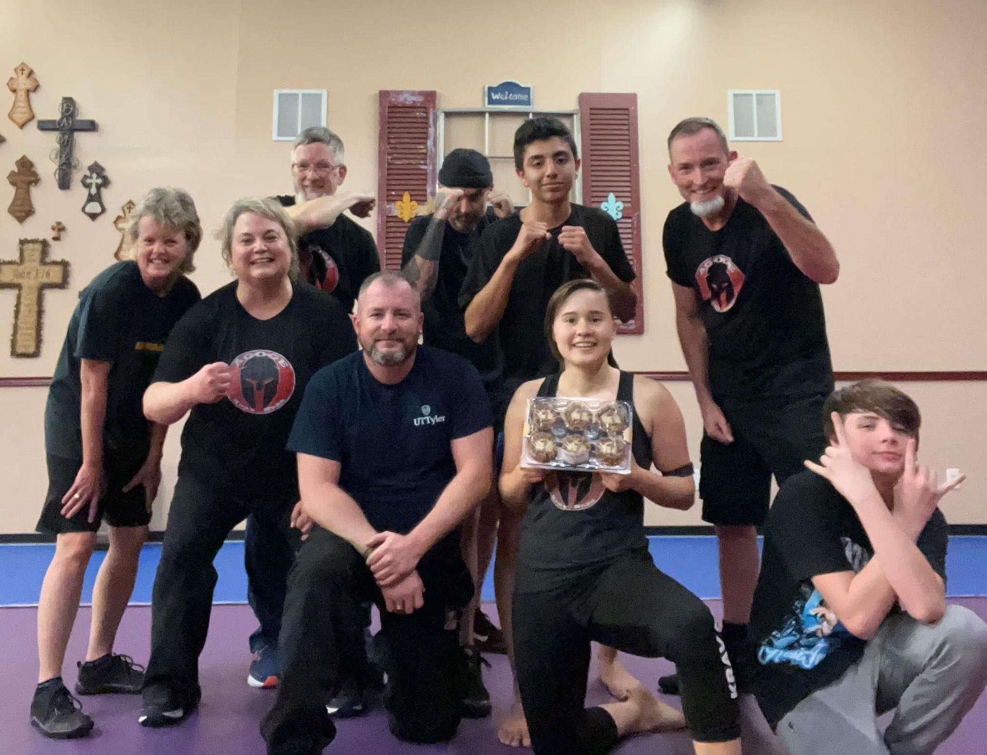 Group of adults and teens at Agoge Krav Maga in Lindale TX after completing a beginner defense techn