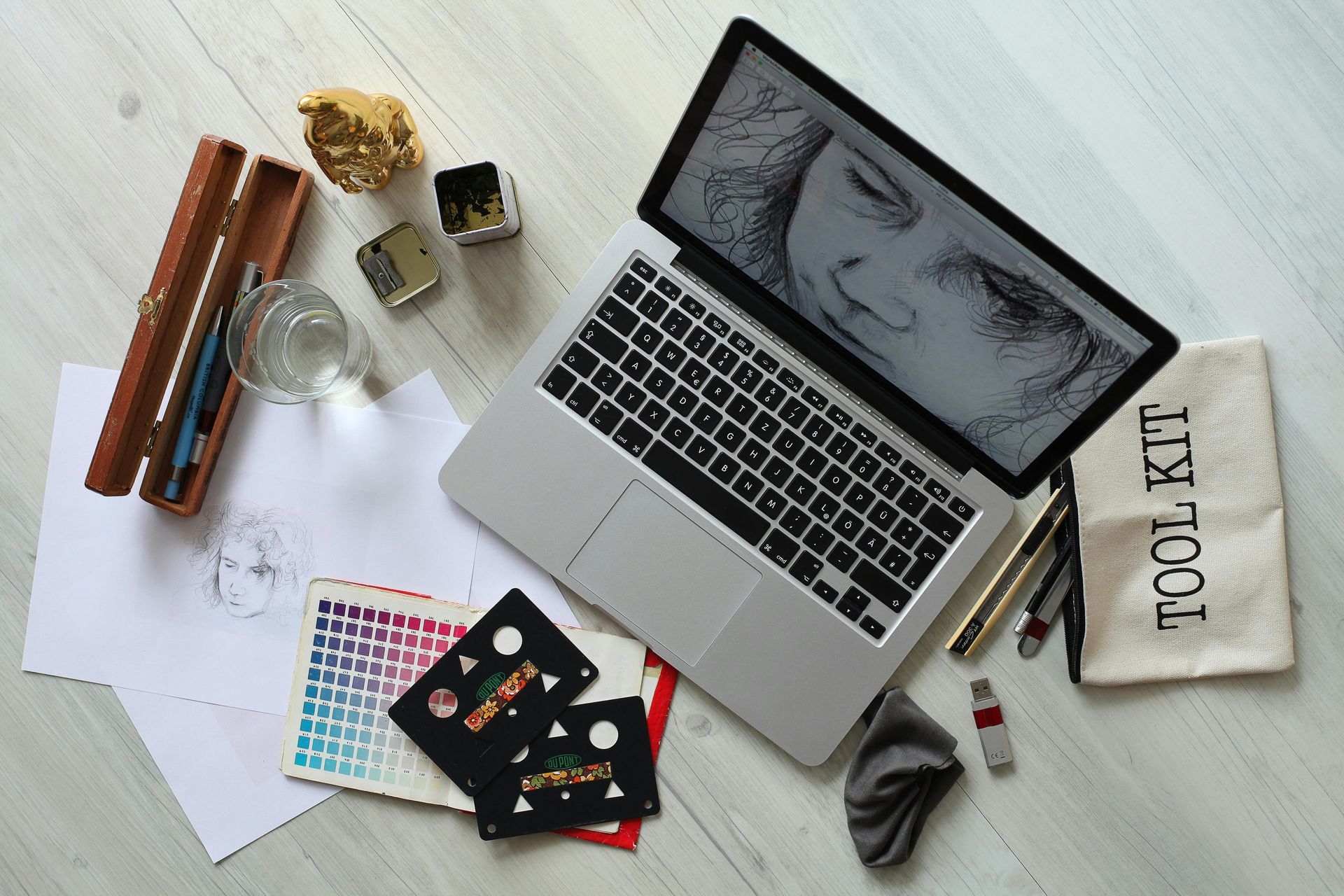 A laptop with a picture of a woman on the screen