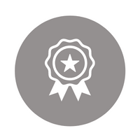 Gray award badge icon with a star and ribbon