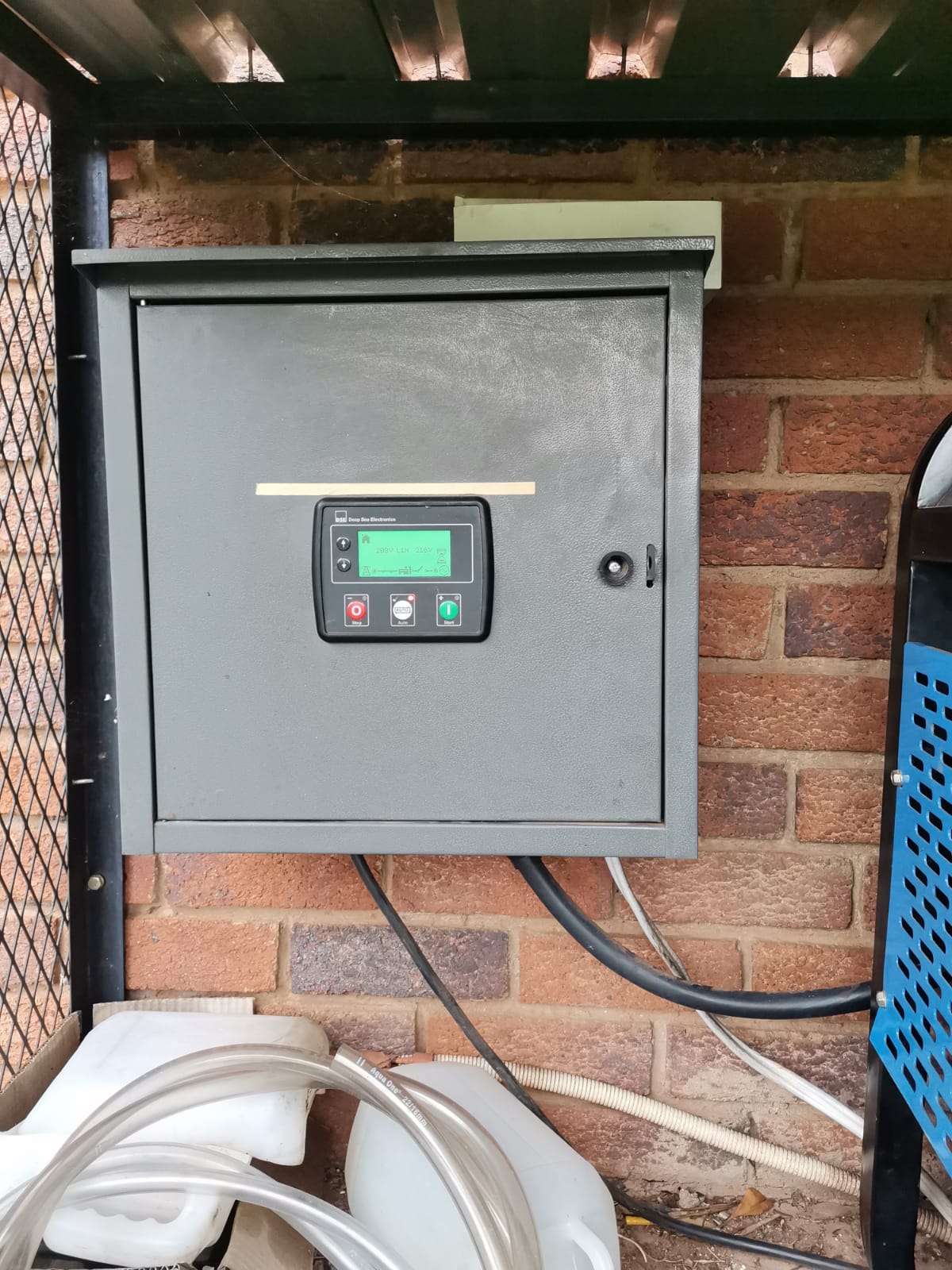 Electrical distribution board connected to electrical mains and fuel generator