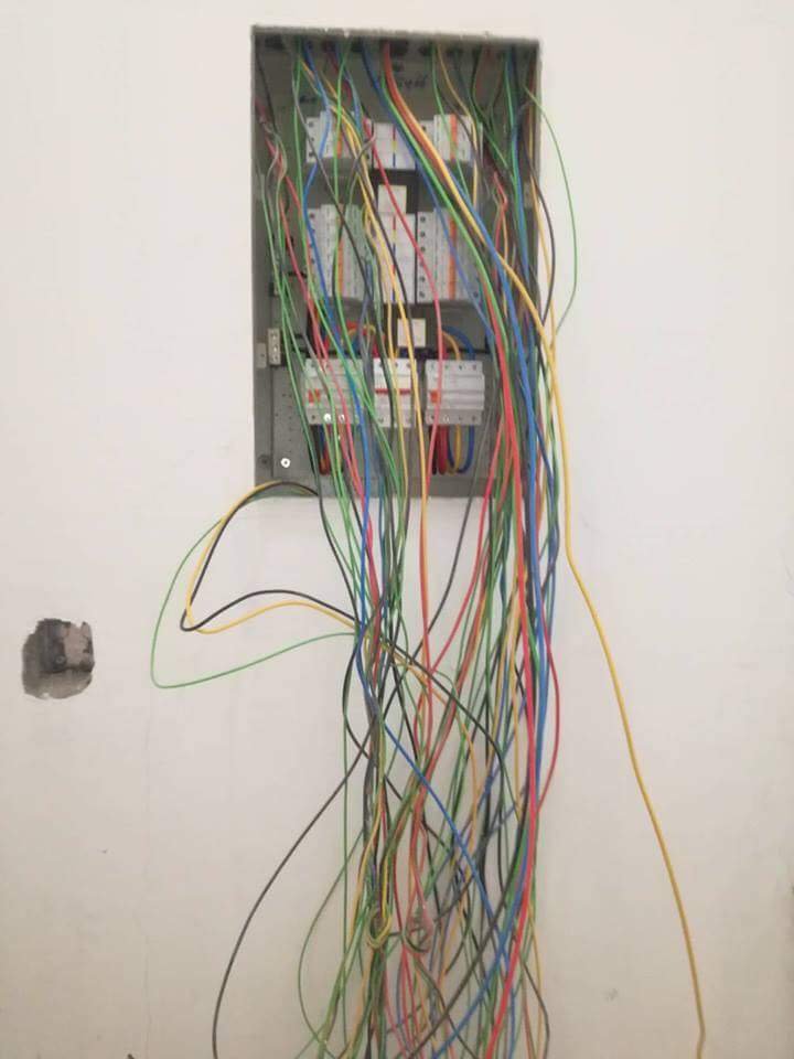 Electrical wires hanging from db board