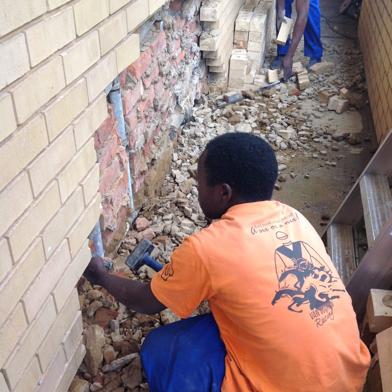 Worker doing plumbing renovations