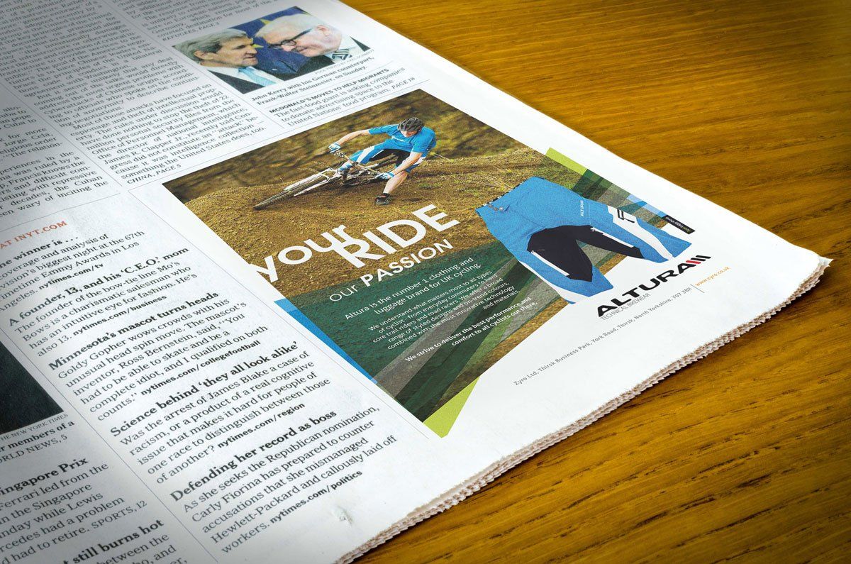 Newspaper ad: Mountain biker on trail.