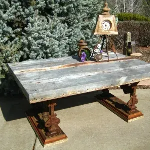 A wooden table with a clock on top of it