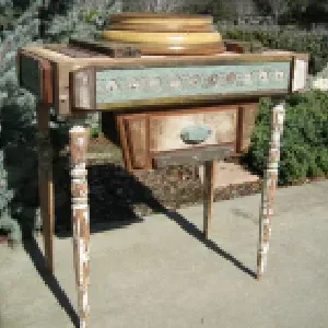 A wooden table with a drawer underneath it