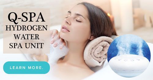 A woman is taking a bath with a hydrogen water spa unit.