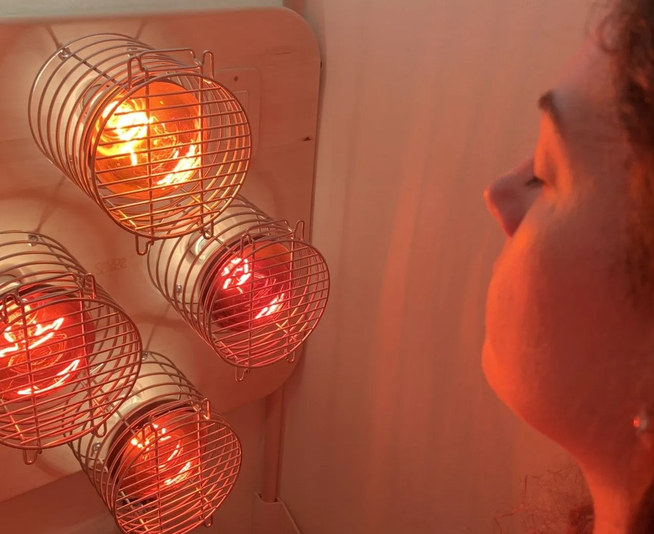 A woman experiencing Near Infrared Sauna