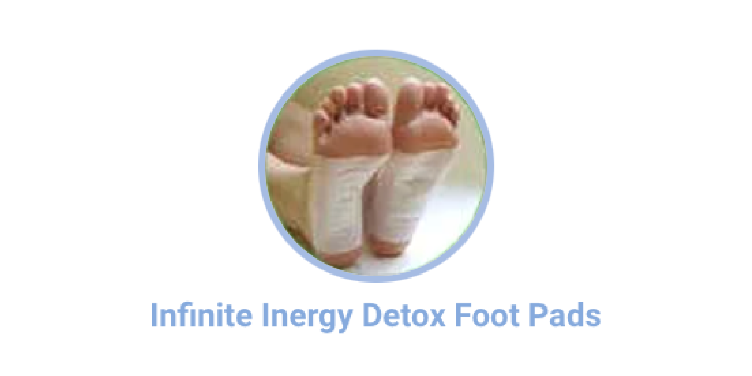 A pair of feet with detox foot pads on them.