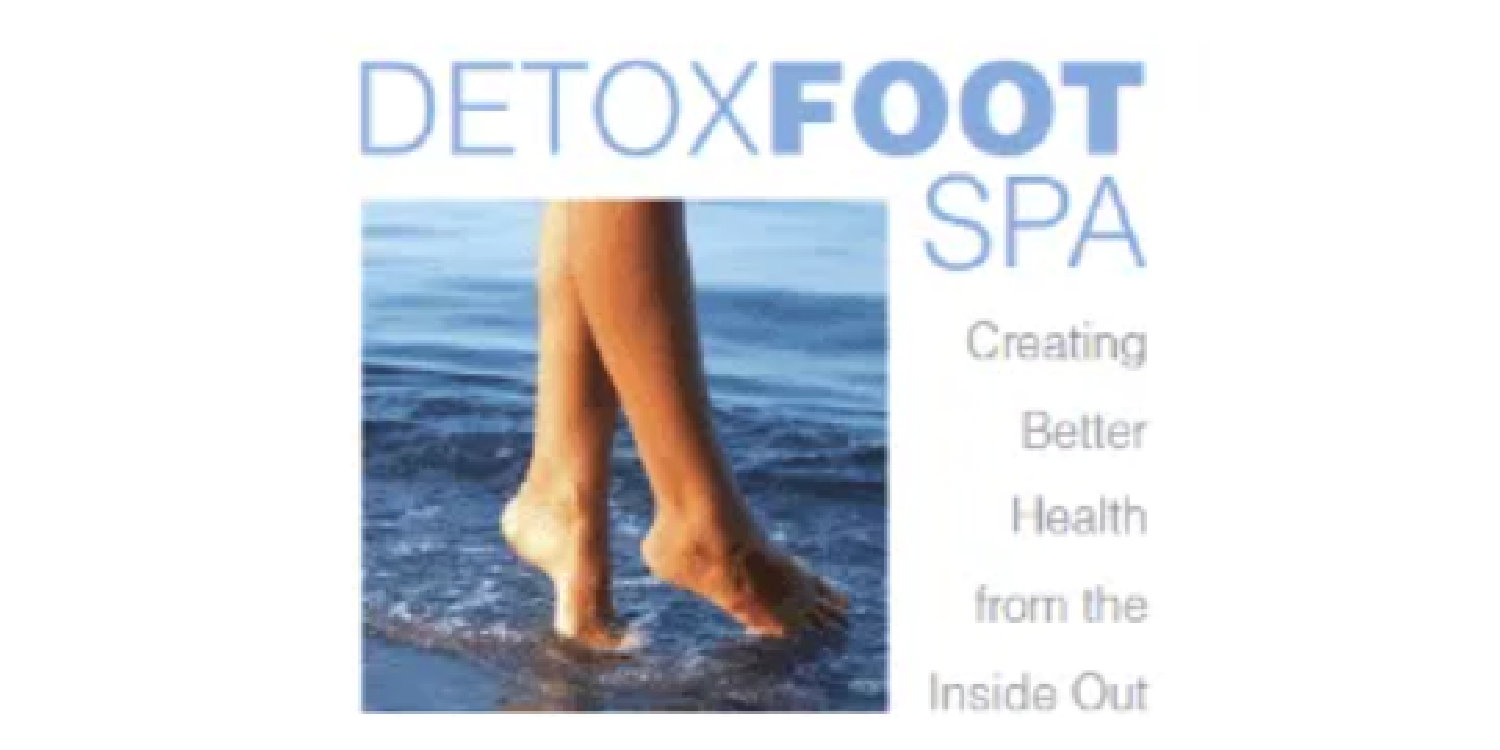 A picture of a woman 's feet walking in the water with the words detoxfoot spa below it