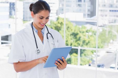 a doctor reading a patient's chart