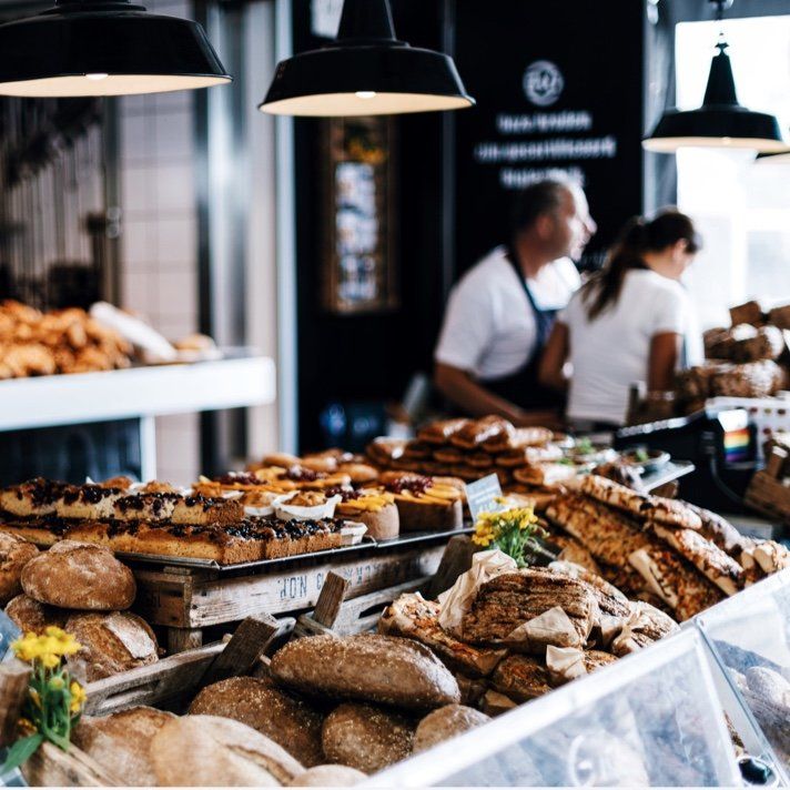 A bakery filled with lots of bread and pastries