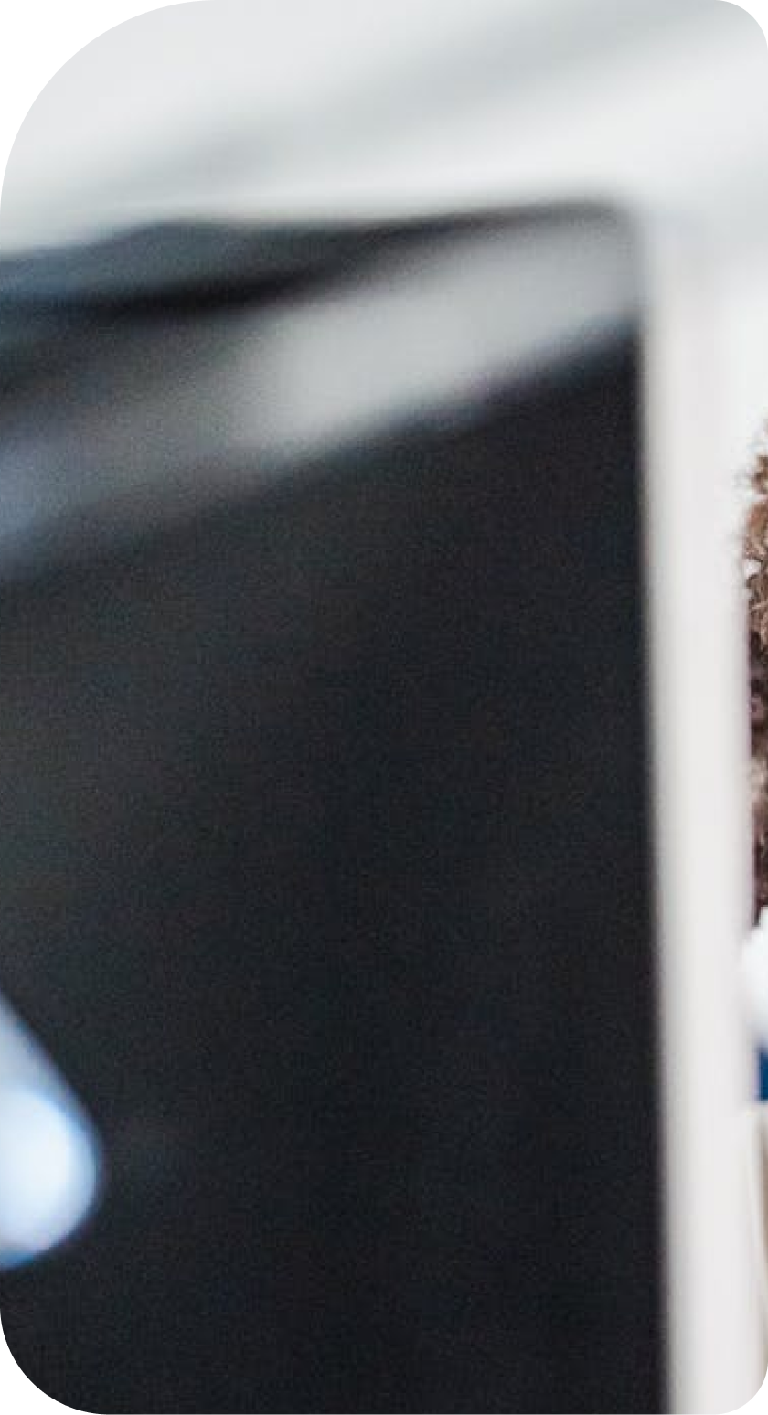 A close up of a black object with a white border.