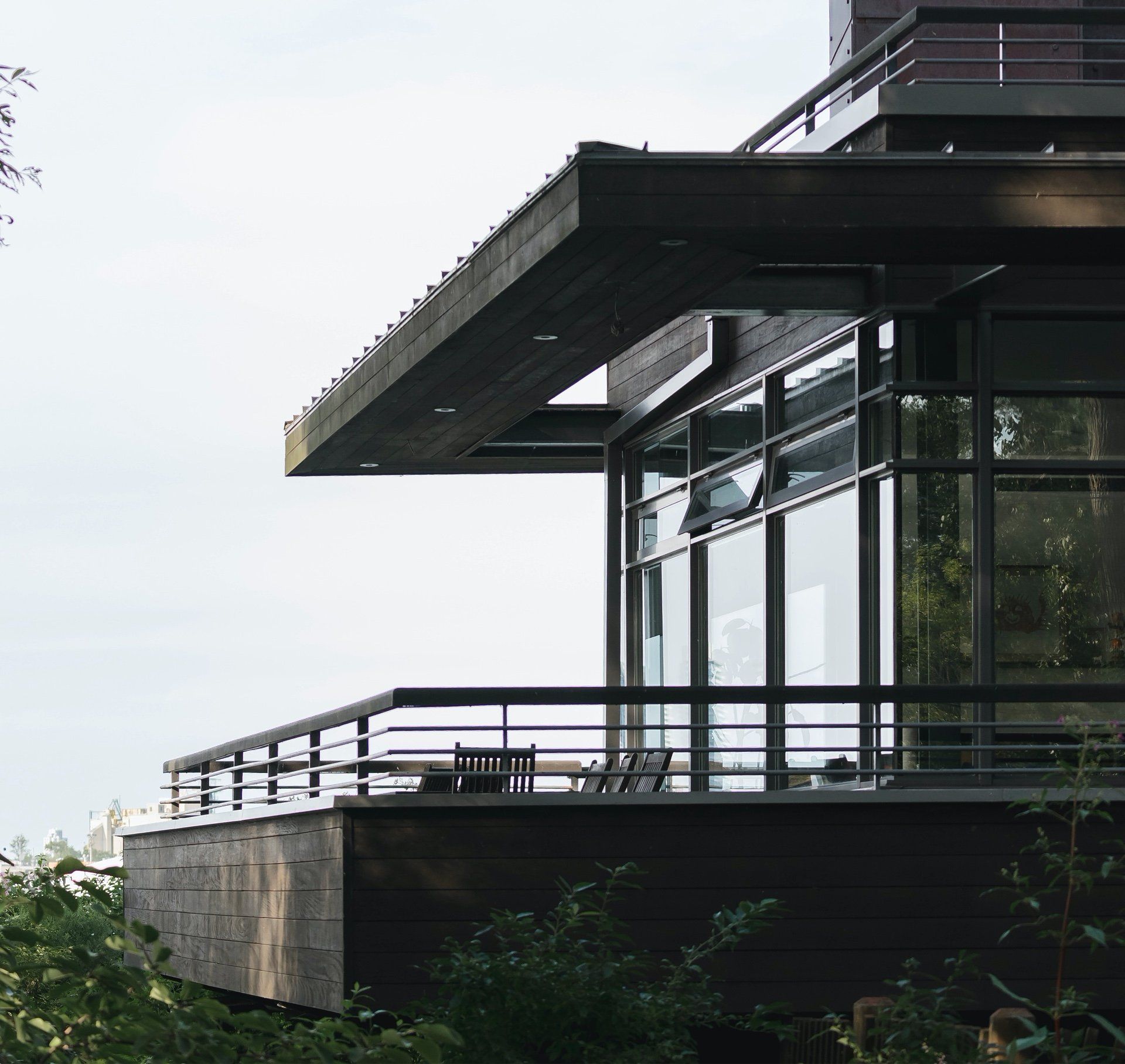 A large building with a balcony and lots of windows