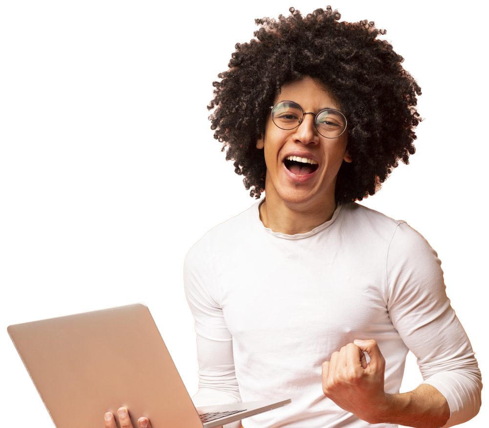 A man with an afro is holding a laptop and celebrating.