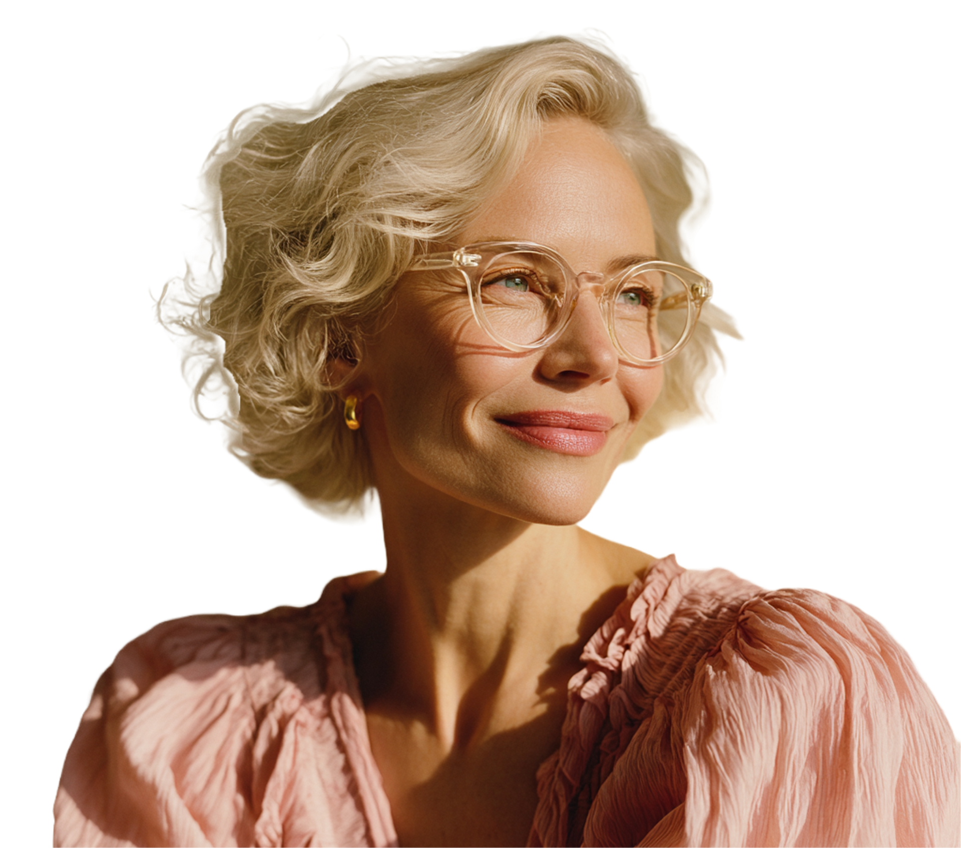 Woman with short, curly, blonde hair wearing glasses, smiling, and looking to the side in sunlight.