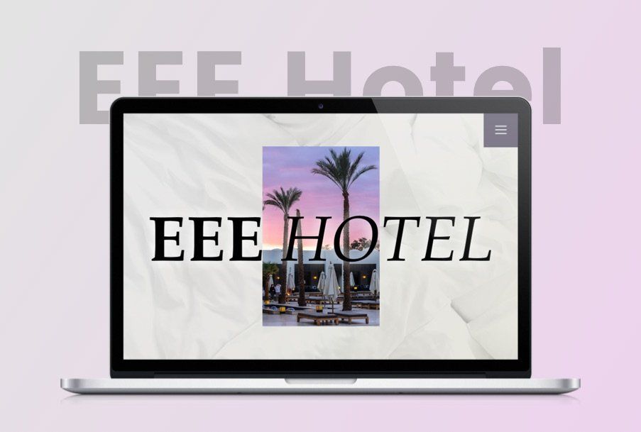 Una computadora portátil está abierta a un sitio web para el hotel eee