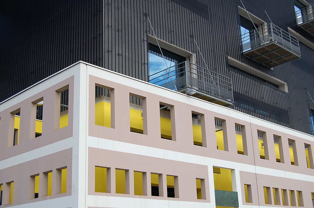 A building with a lot of windows and a fire escape