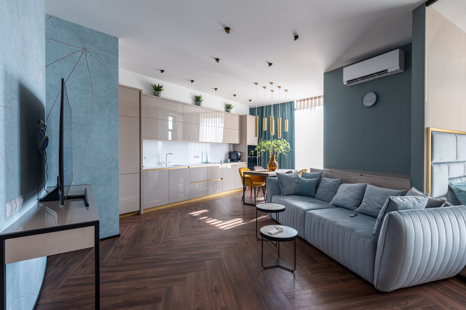 A living room filled with furniture and a flat screen tv.