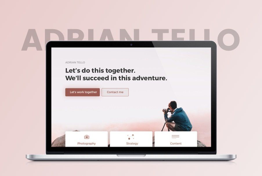 A laptop with a man sitting on top of a mountain taking a picture on the screen.