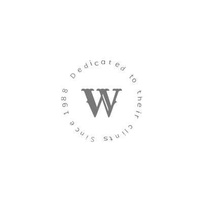A black and white logo with the letter w in a circle.