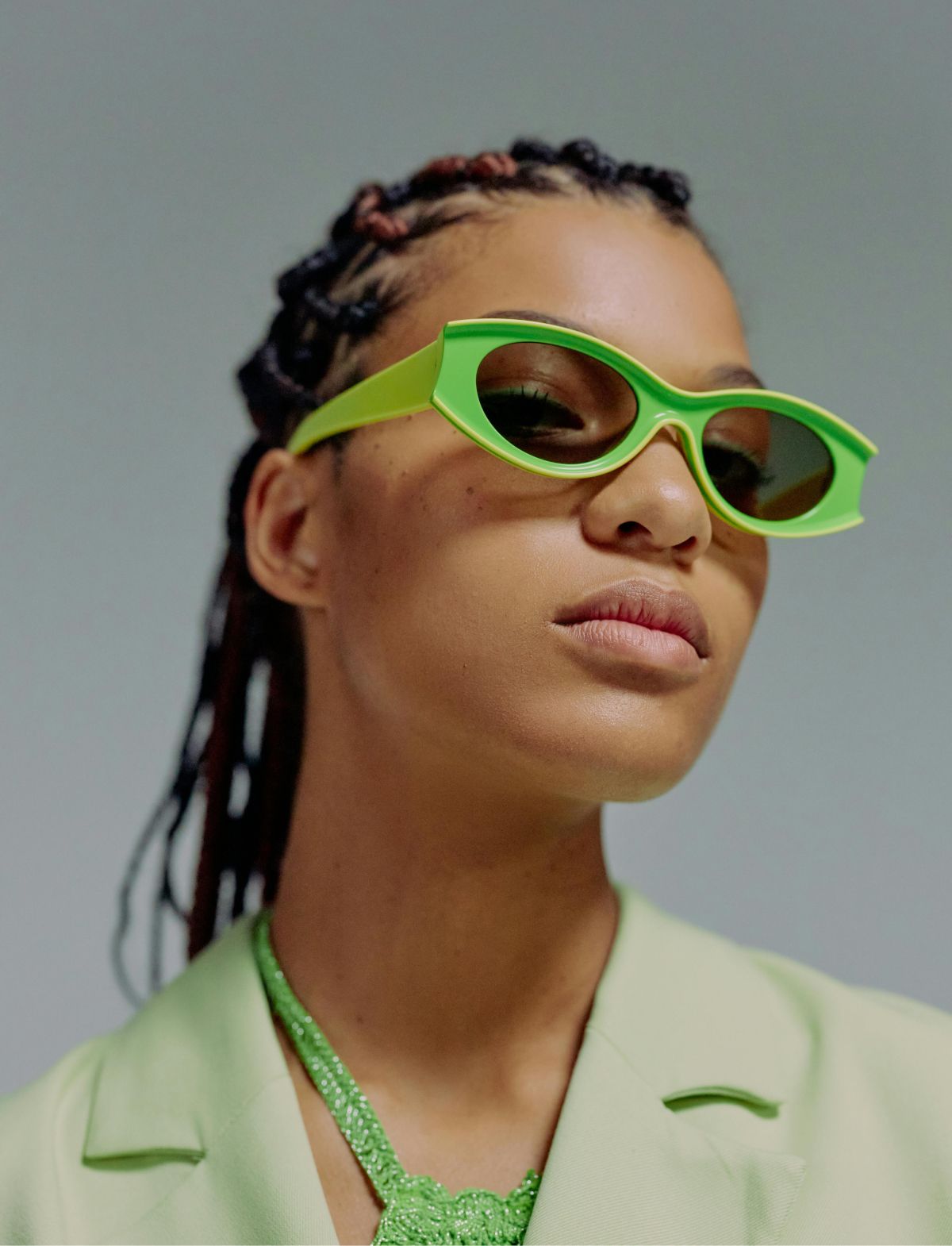 girl wearing green sunglasses