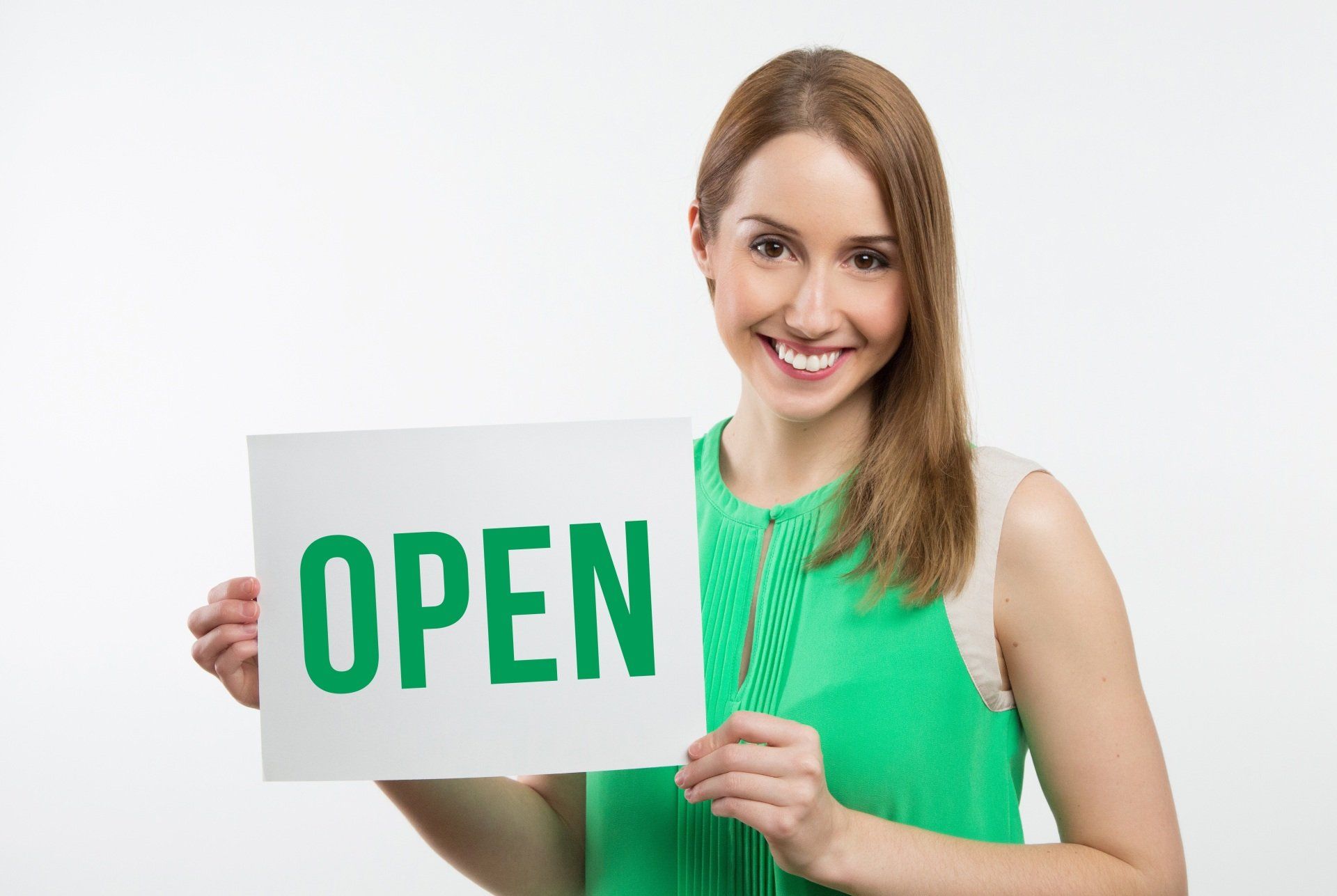 Image of a lady holding an open sign