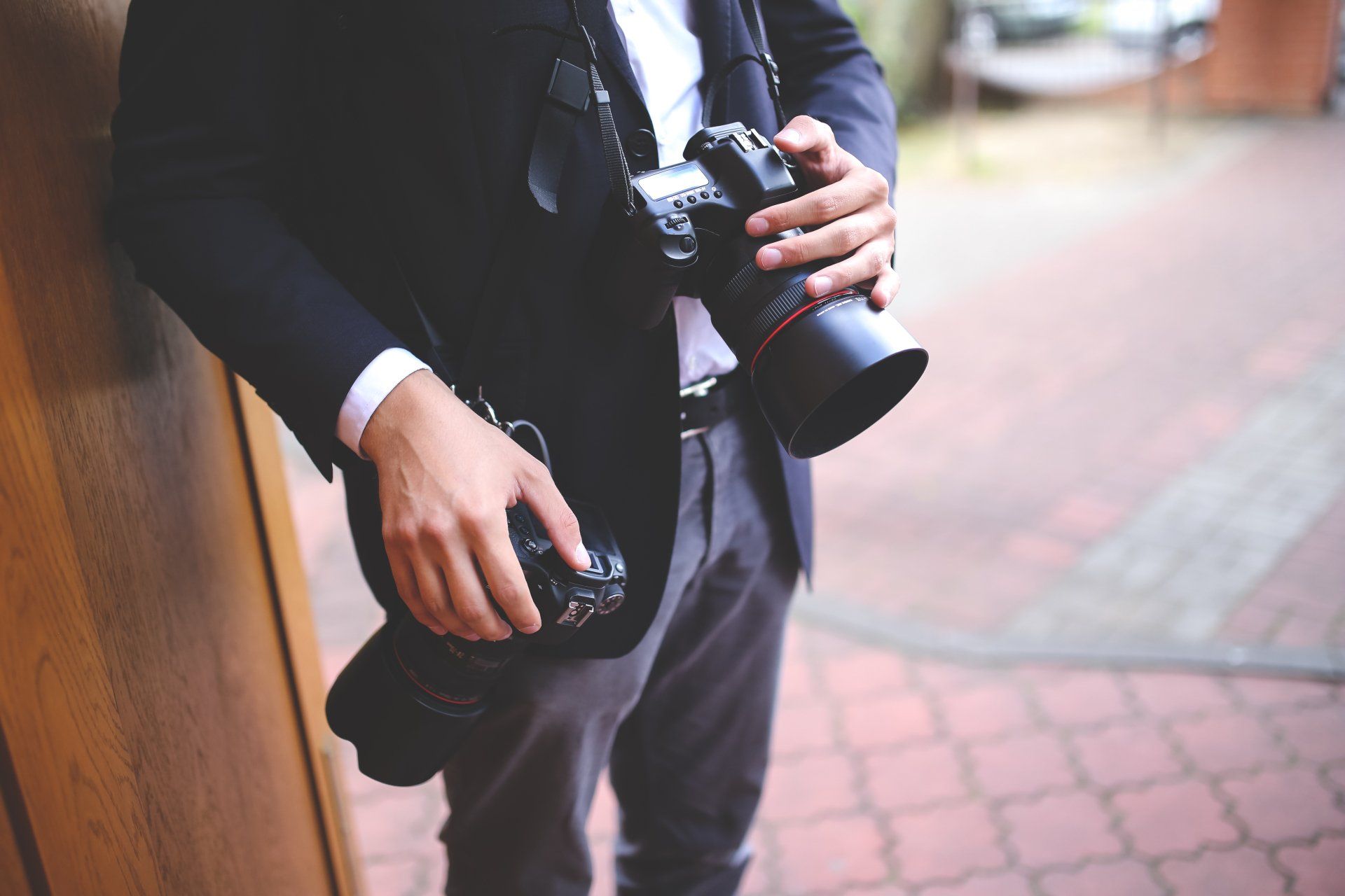 Male roaming photographer with two cameras ready to capture all of the moments for Ever After