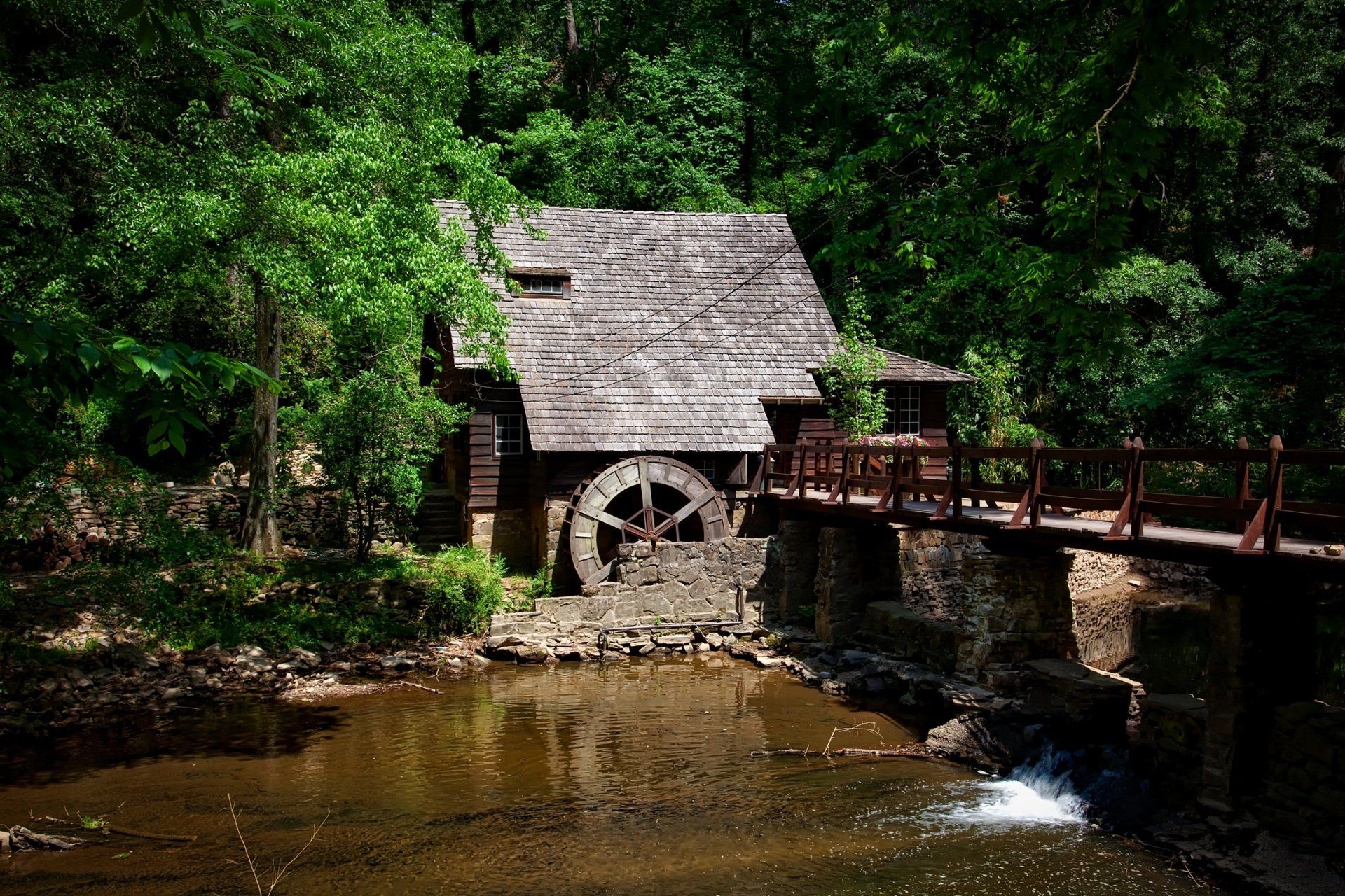 Lumber mill in Alabama, powered by a water wheel
