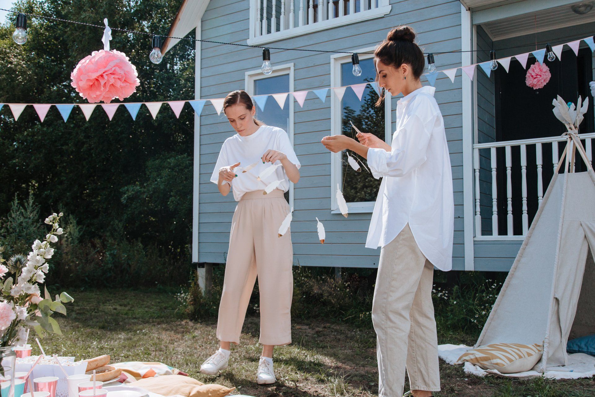 two person setting up on the front yard