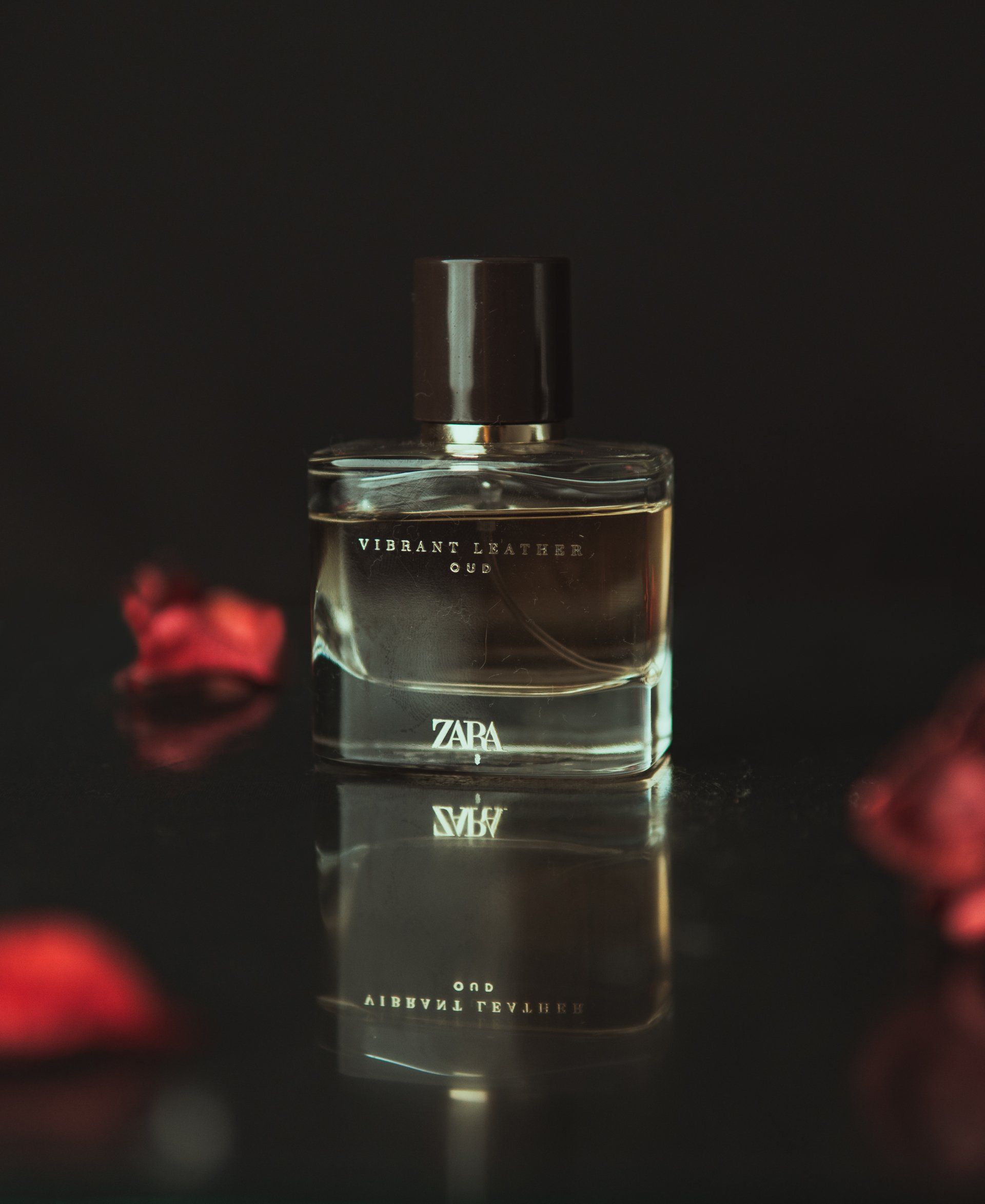 A bottle of zara perfume is sitting on a table