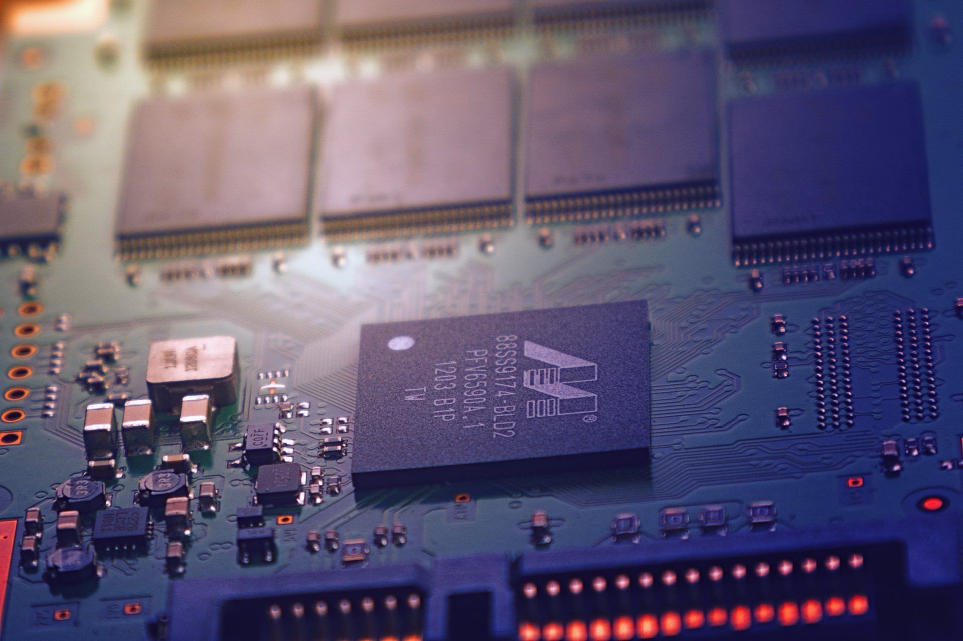 A close up of a motherboard with a chip on it.