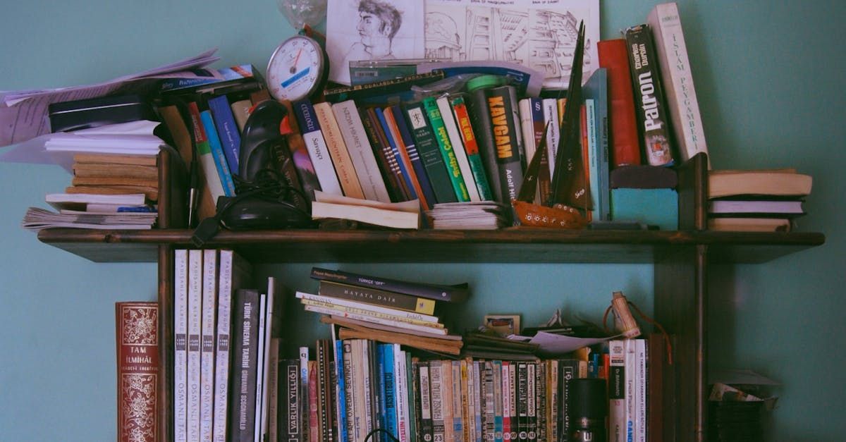 Messy shelves full of books and clutter