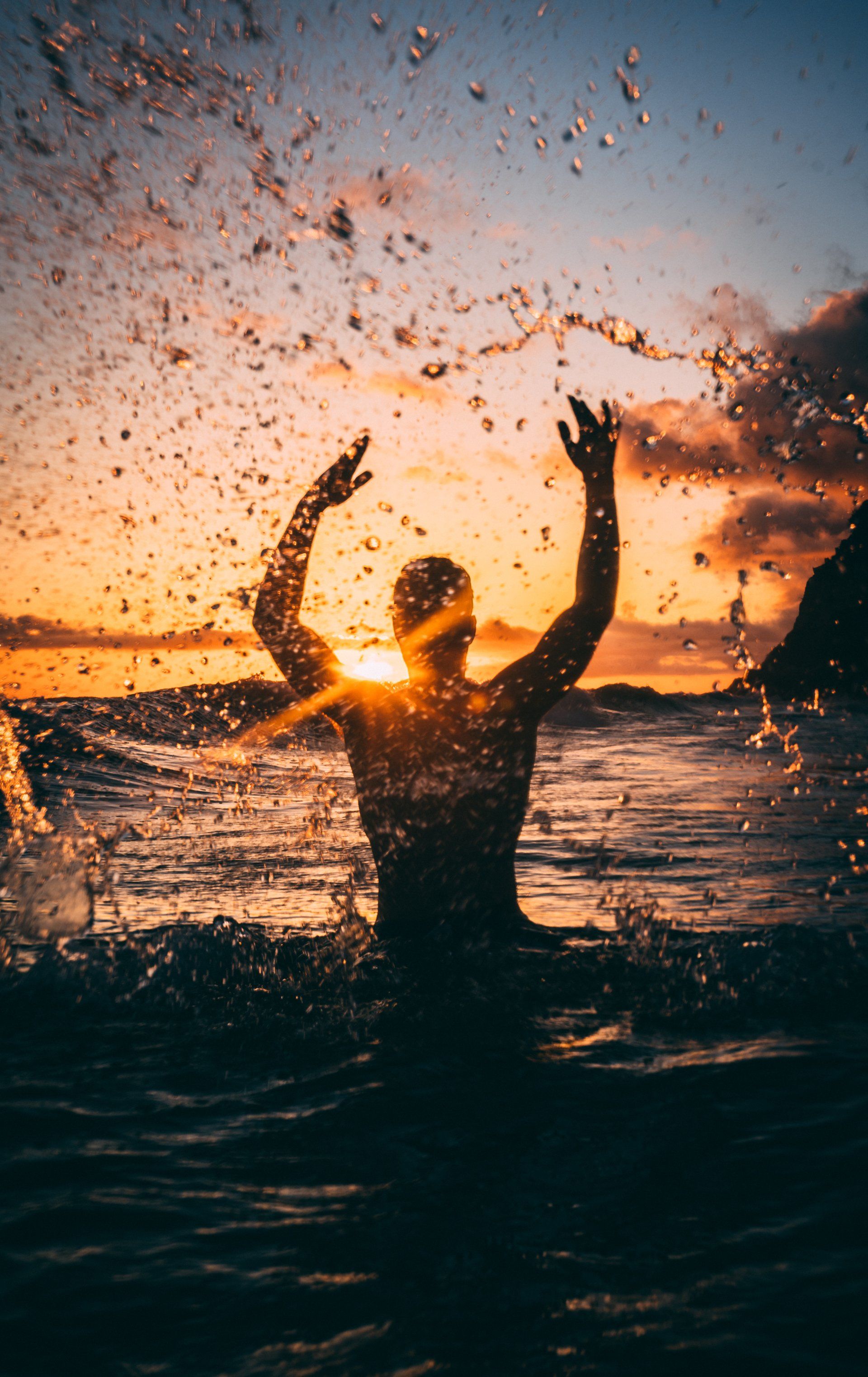 person,  arms up, sunset, water