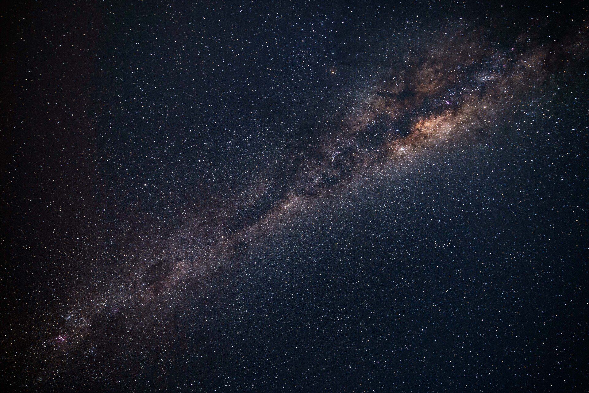The milky way galaxy is visible in the night sky