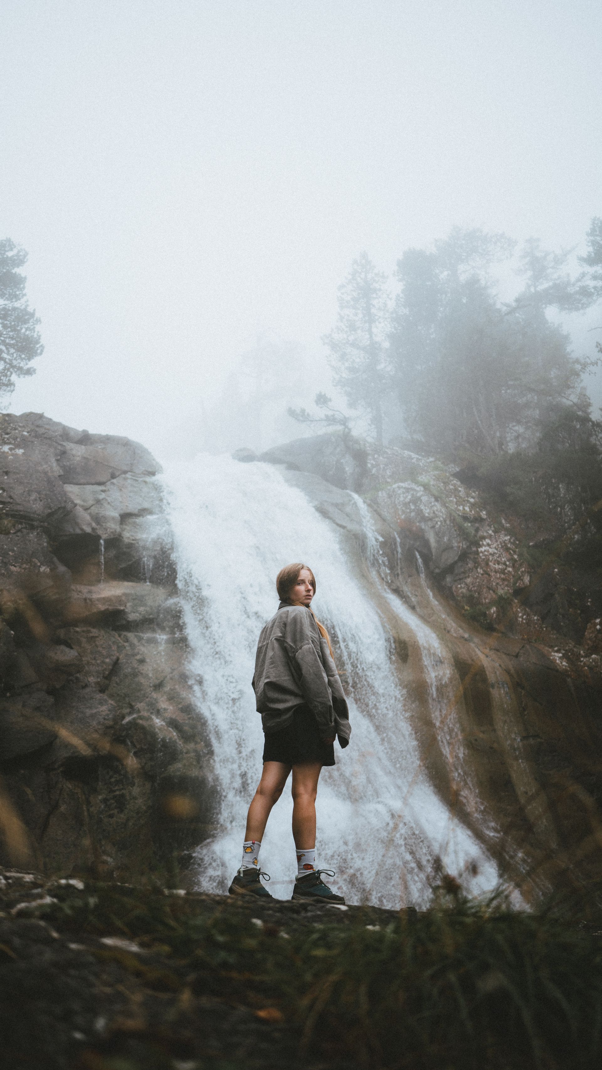 girl-hiking-waterfall