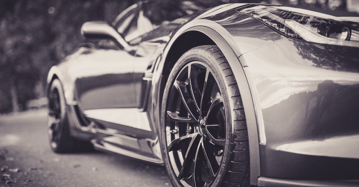 a close up of a car wheel with the word audi on it