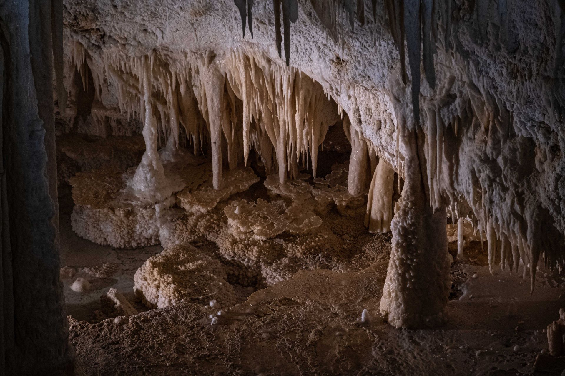 A cave filled with lots of stalagmites and stalactites.