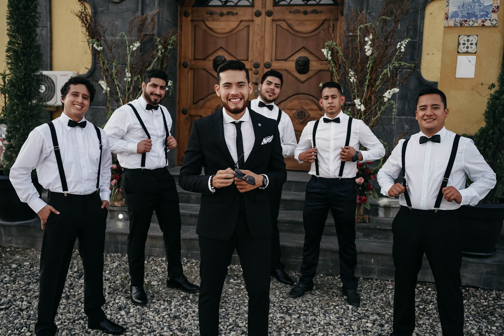 The groom with his best man and groomsmen at Flash Party Photo Booth rental in San Antonio