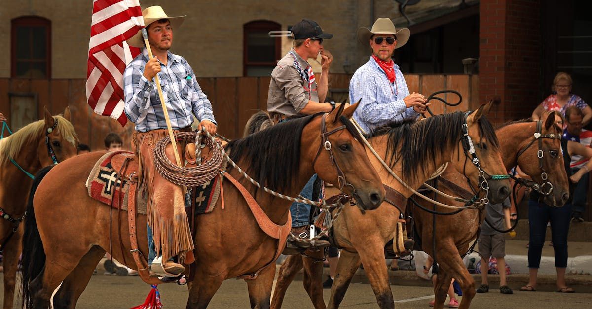 A group of men are riding horses in a parade.