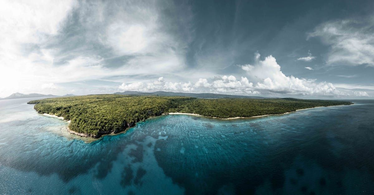 An aerial view of a small island in the middle of the ocean.