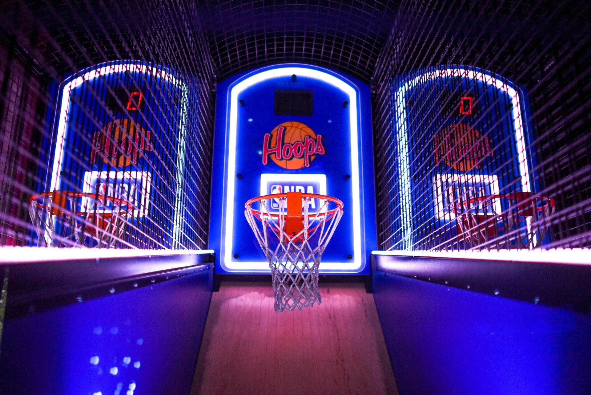 electric basketball hoops at an arcade