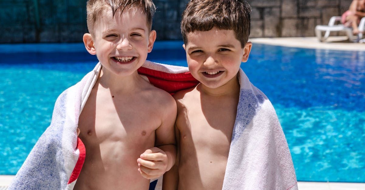 Friends swimming together at pool in Virginia Beach, VA