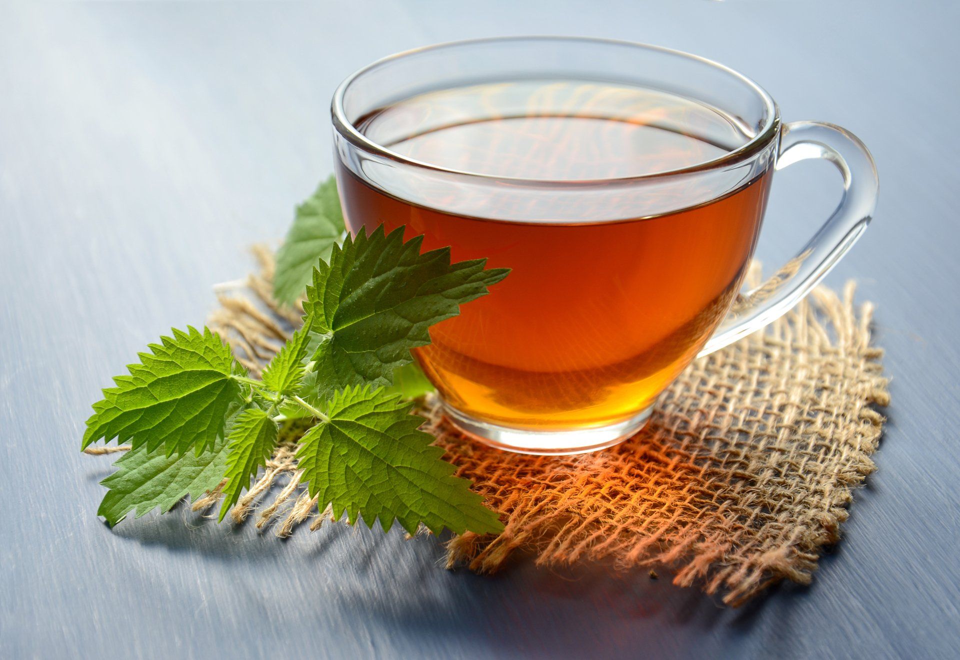 photo of a green tea in a glass cup